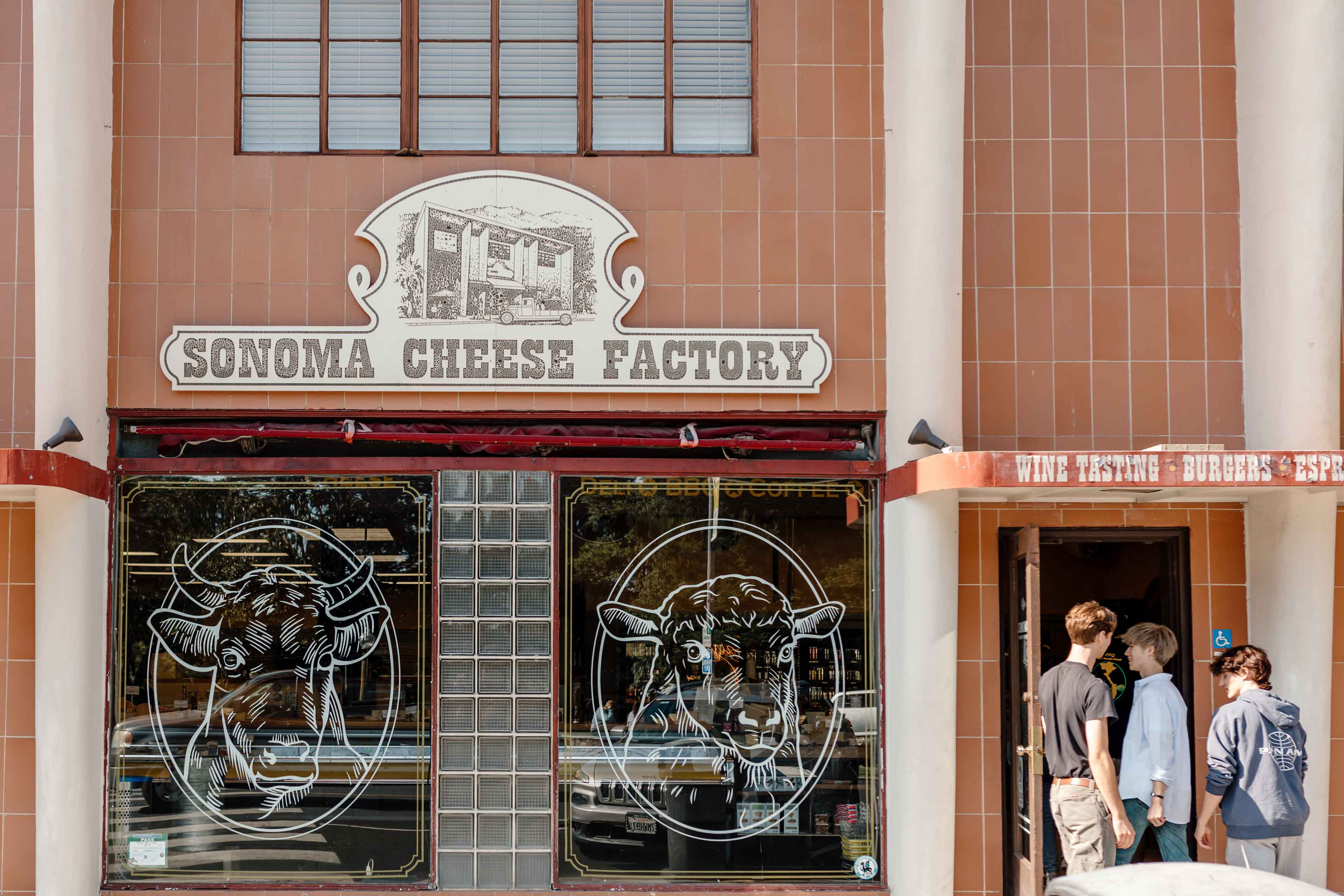people entering the cheese factory